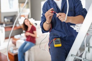 electrician-working-in-living-room-sehna